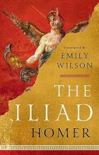 Cover image of The Iliad by Homer, translated by Emily Wilson, featuring gold leaf which is peeling back to reveal the image of a Greek painting of a person with wings holding a helmet
